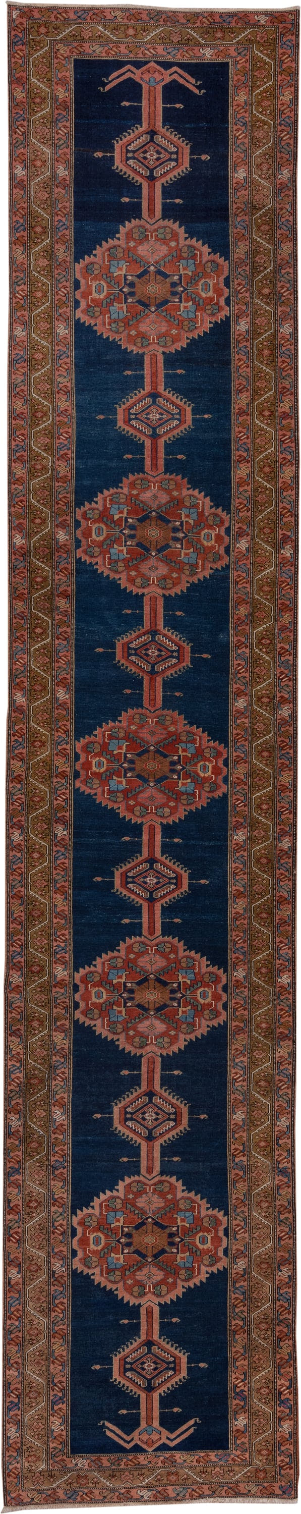 3' x 17' one-of-a-kind handmade antique Serapi runner rug. Color palette: navy, rust, camel, ivory, terra cotta, sage