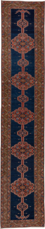 3' x 17' one-of-a-kind handmade antique Serapi runner rug. Color palette: navy, rust, camel, ivory, terra cotta, sage