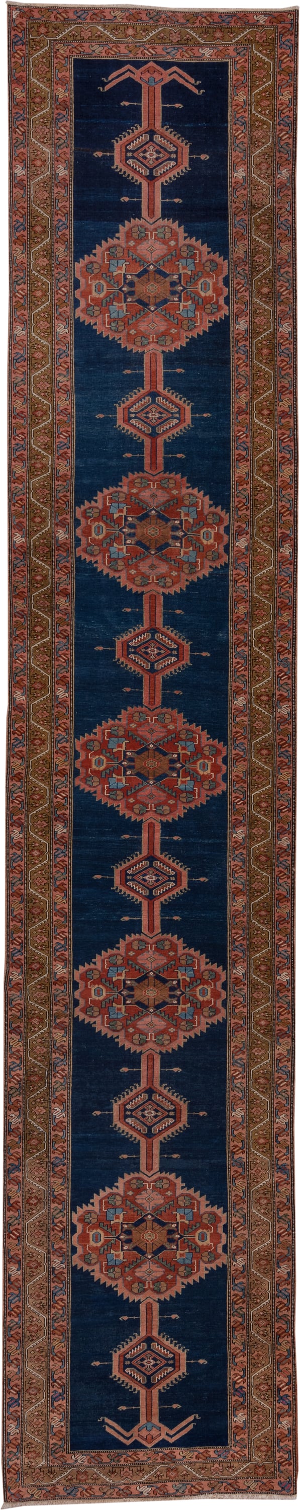 3' x 17' one-of-a-kind handmade antique Serapi runner rug. Color palette: navy, rust, camel, ivory, terra cotta, sage