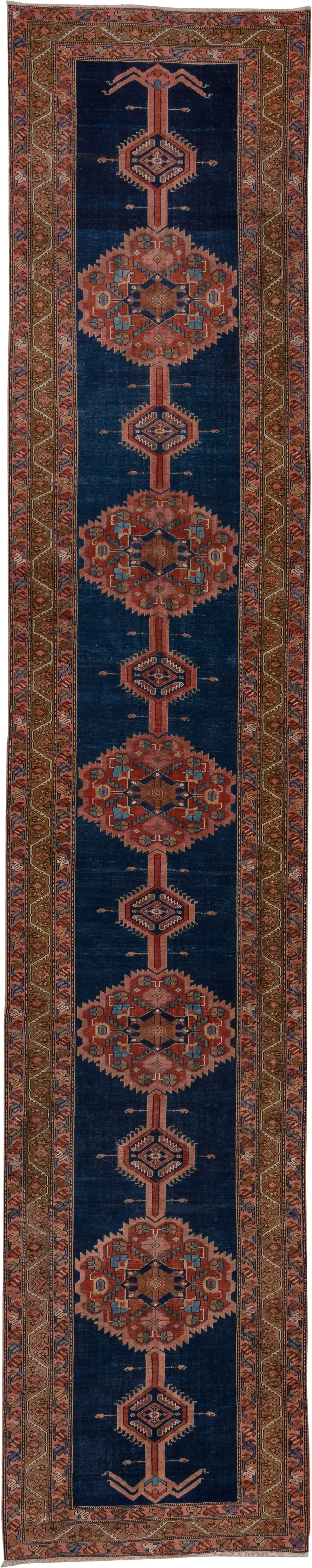 3' x 17' one-of-a-kind handmade antique Serapi runner rug. Color palette: navy, rust, camel, ivory, terra cotta, sage
