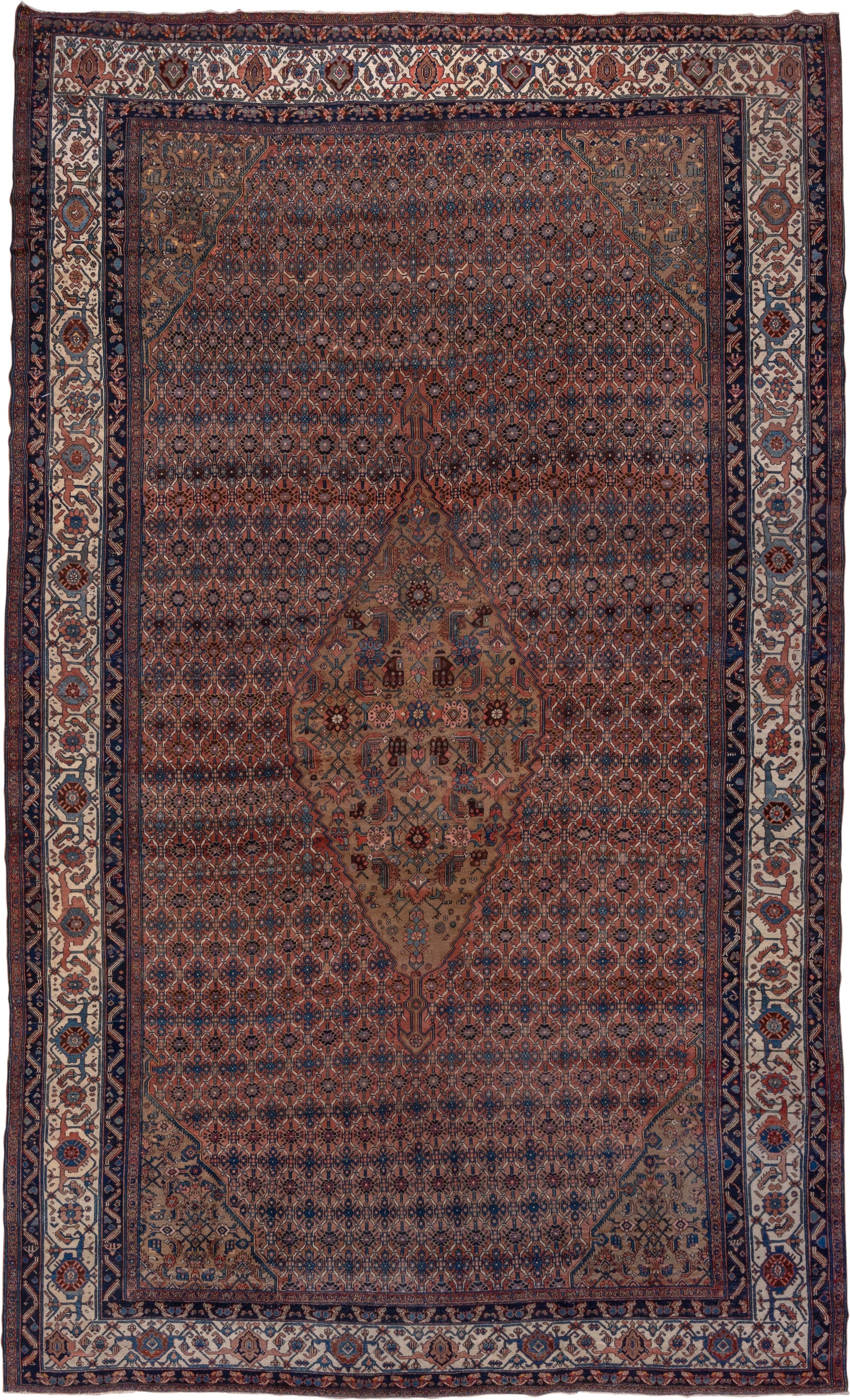 12' x 21' one-of-a-kind handmade antique Bibikabad oversize rug. Color palette: rust, navy, ivory, camel, terra cotta, slate