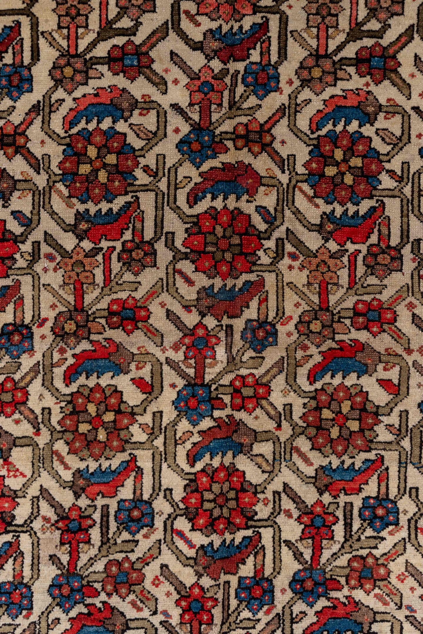 5' x 7' one-of-a-kind handmade antique Malayer rug. Color palette: ivory, rust, indigo, rose, taupe, charcoal, coral