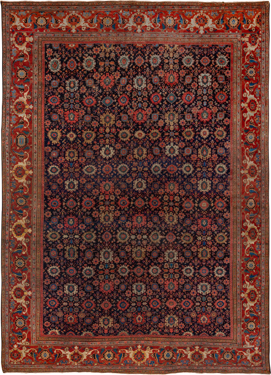 14' x 19' one-of-a-kind handmade antique Sultanabad oversize rug. Color palette: navy, rust, ivory, sky blue, terra cotta
