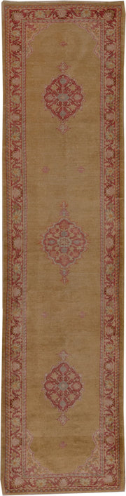 2' x 11' one-of-a-kind handmade antique Oushak runner rug. Color palette: camel, rose, terra cotta, ivory, tan, beige, pink
