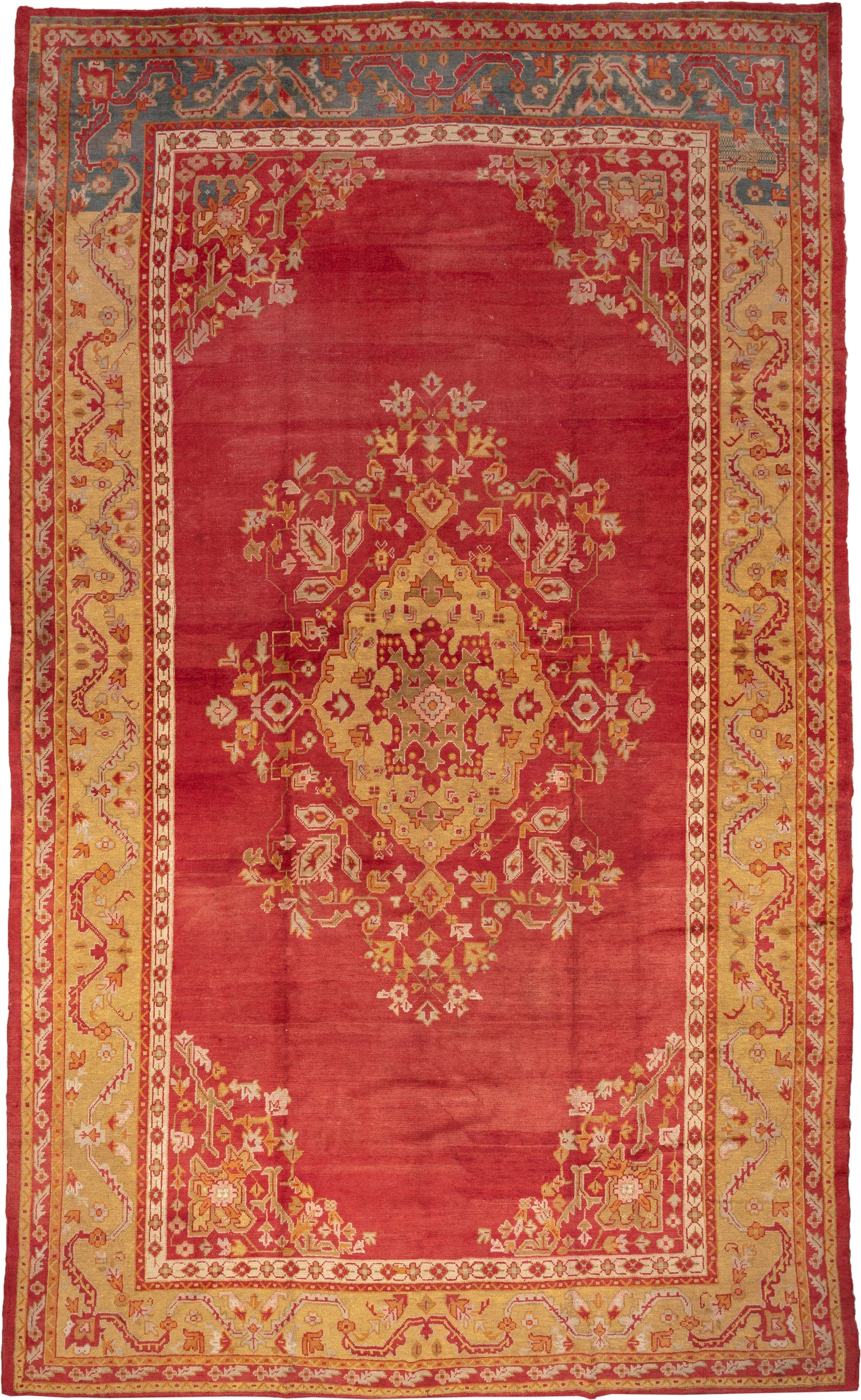 12' x 20' one-of-a-kind handmade antique Oushak oversize rug. Color palette: terra cotta, gold, rust, muted blue, ivory