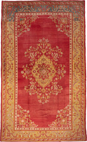 12' x 20' one-of-a-kind handmade antique Oushak oversize rug. Color palette: terra cotta, gold, rust, muted blue, ivory