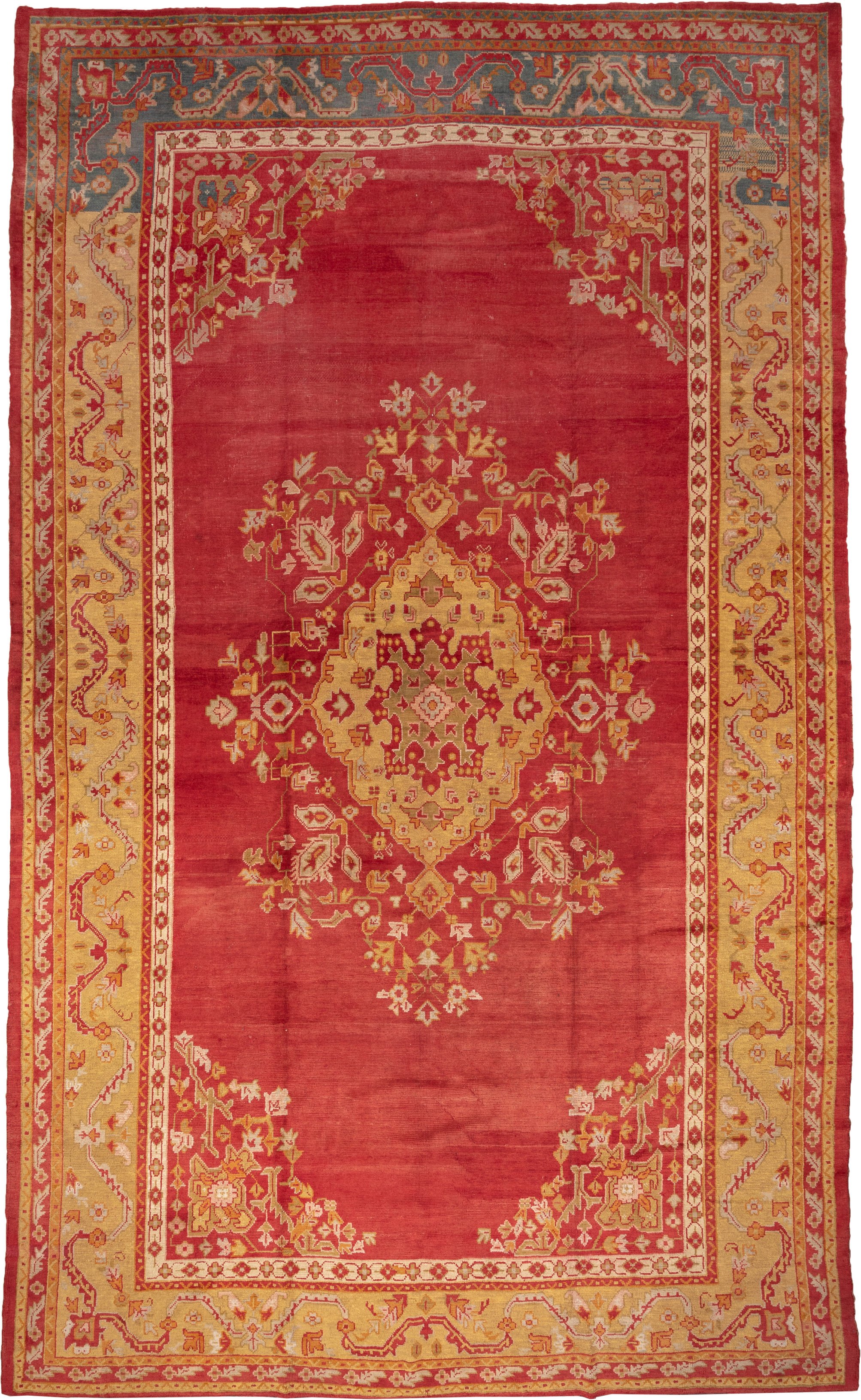 12' x 20' one-of-a-kind handmade antique Oushak oversize rug. Color palette: terra cotta, gold, rust, muted blue, ivory