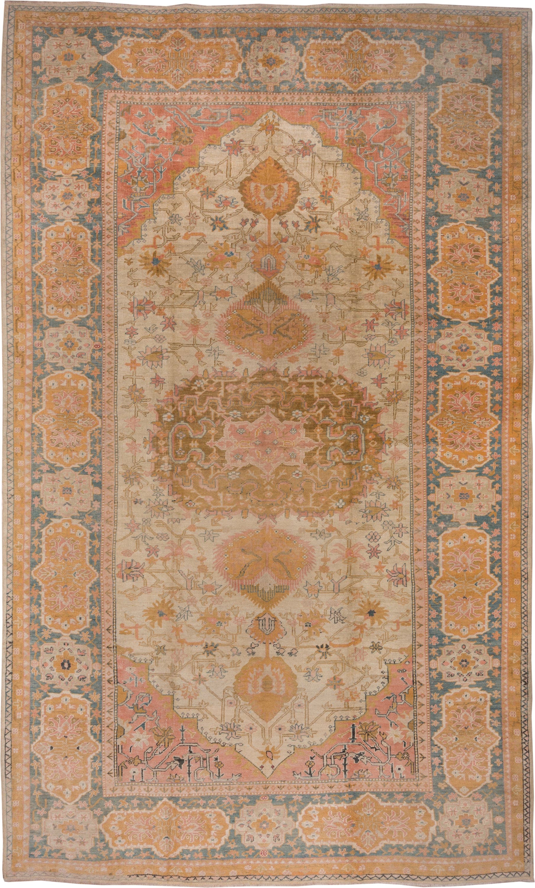 11' x 18' one-of-a-kind handmade antique Oushak oversize rug. Color palette: ivory, apricot, gold, sage, terra cotta, taupe