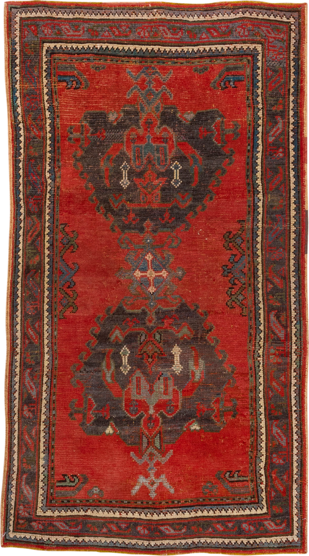 4' x 7' one-of-a-kind handmade antique Oushak rug. Color palette: rust, charcoal, crimson, ivory, slate, terra cotta