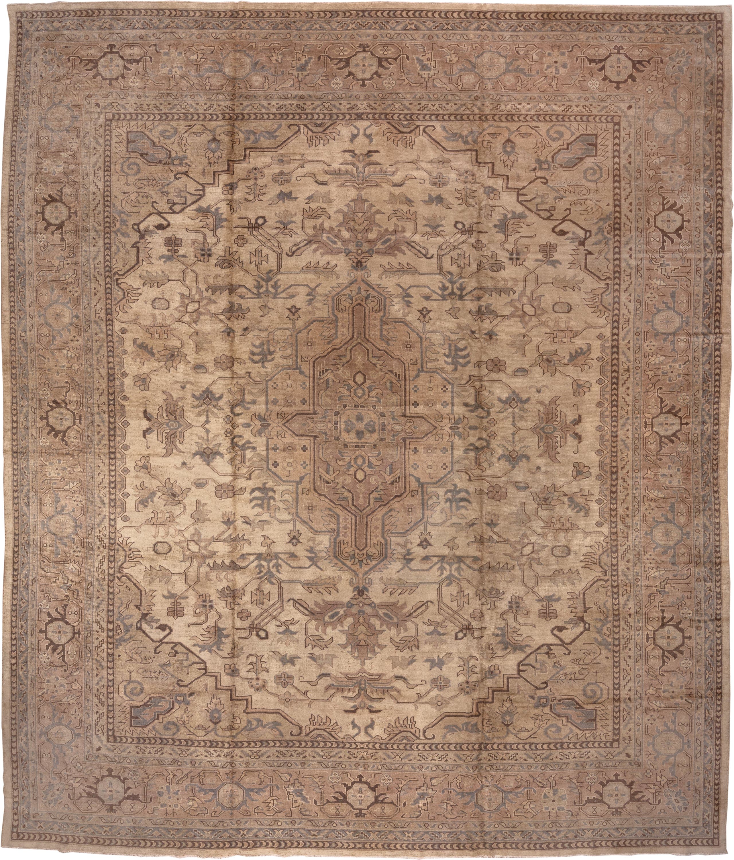 14' x 17' one-of-a-kind handmade antique Oushak oversize rug. Color palette: ivory, taupe, camel, brown, pale blue, beige