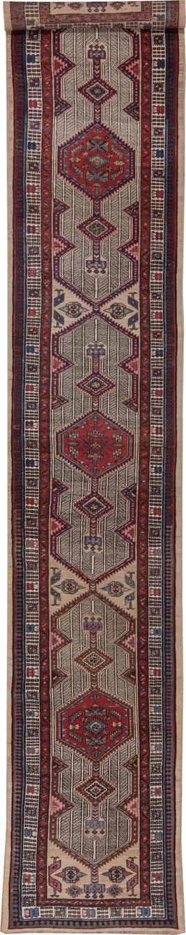 3' x 17' one-of-a-kind handmade vintage Sarab runner rug. Color palette: ivory, rust, indigo, soft_blue, brown, burgundy