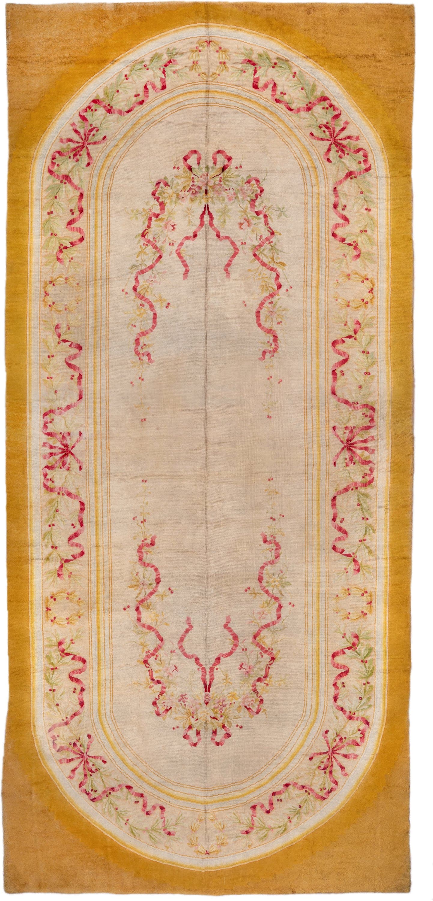 12' x 28' one-of-a-kind handmade antique Savonnerie oversize rug. Color palette: gold, ivory, rose, sage, cream, soft_green