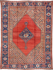 15' x 20' one-of-a-kind handmade antique Serapi oversize rug. Color palette: terra cotta, indigo, ivory, rust, coral, navy