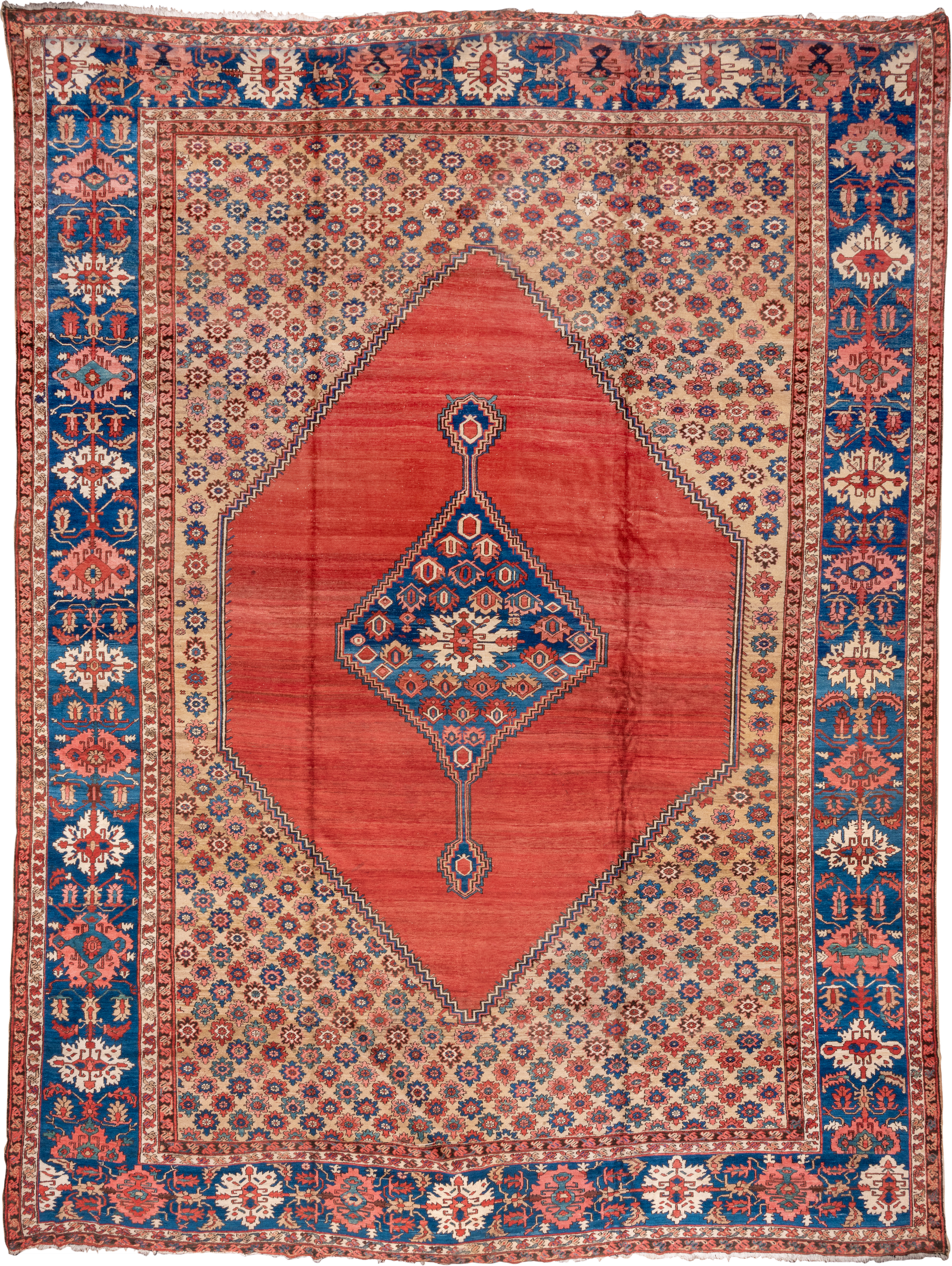 15' x 20' one-of-a-kind handmade antique Serapi oversize rug. Color palette: terra cotta, indigo, ivory, rust, coral, navy