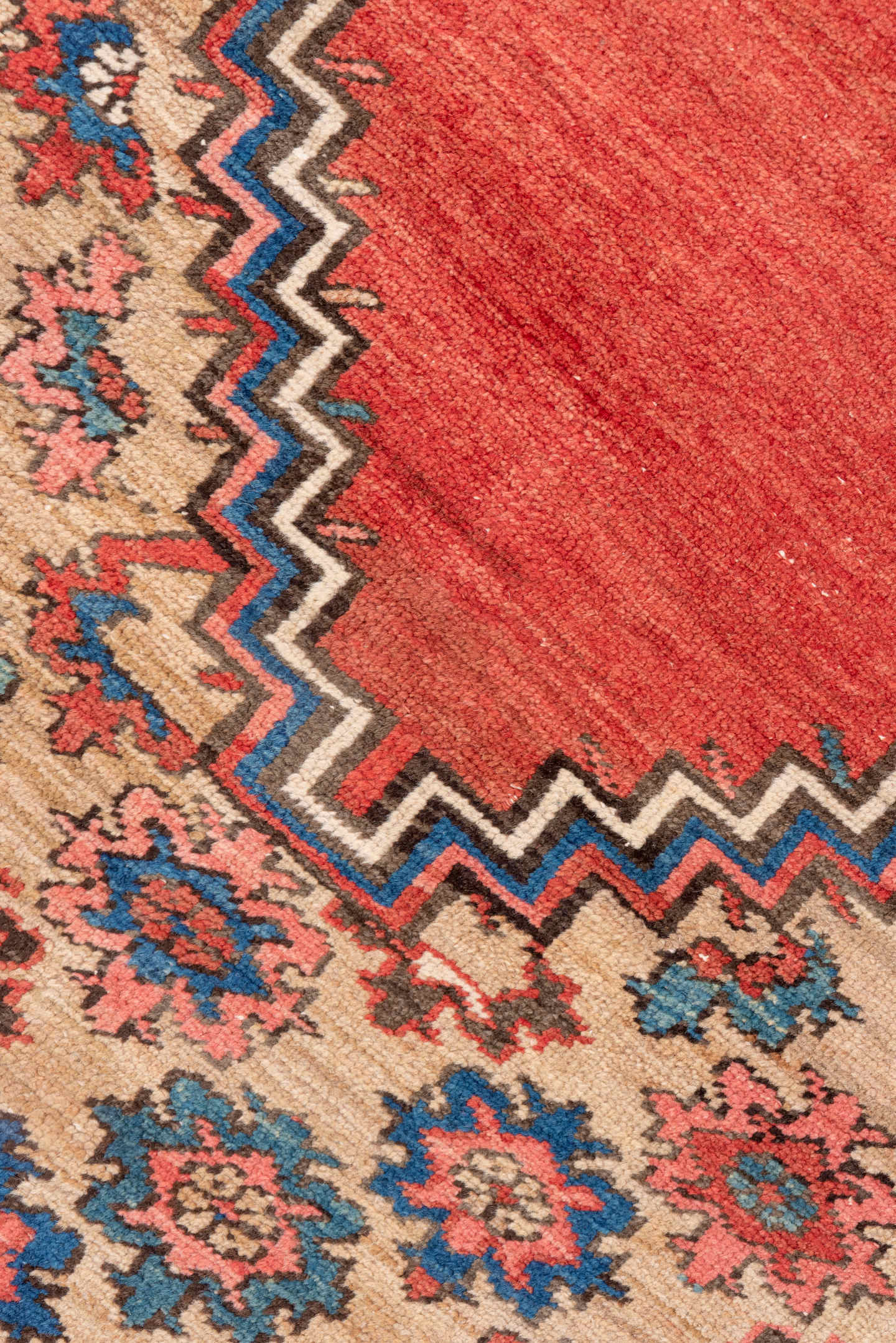 15' x 20' one-of-a-kind handmade antique Serapi oversize rug. Color palette: terra cotta, indigo, ivory, rust, coral, navy