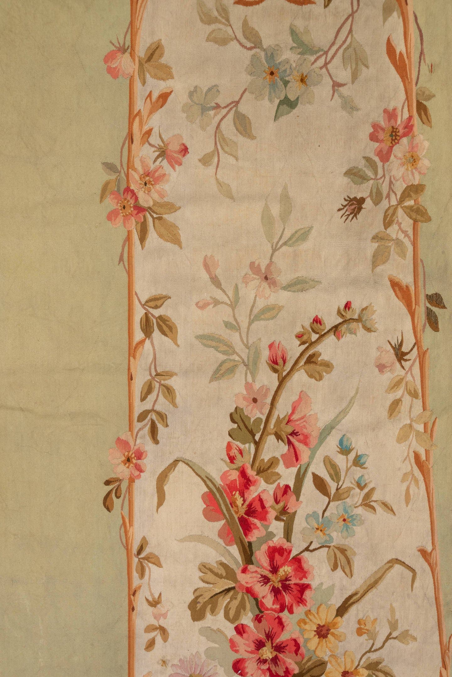 2' x 7' one-of-a-kind handmade antique Aubusson runner rug. Color palette: sage, ivory, rose, coral, gold, taupe, lavender
