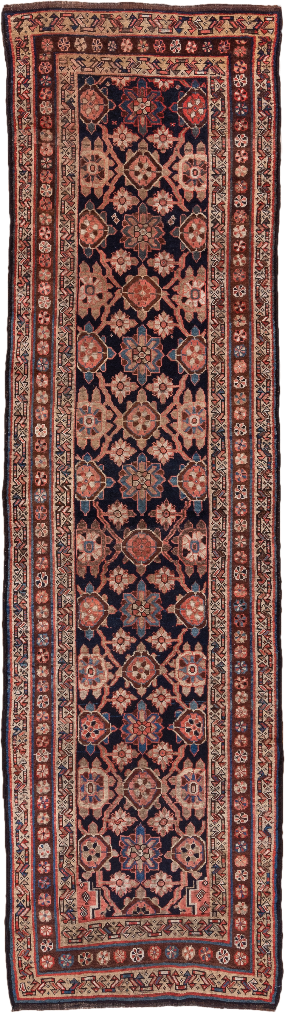 3' x 11' one-of-a-kind handmade antique Kurd runner rug. Color palette: navy, ivory, rust, crimson, camel, slate, blue