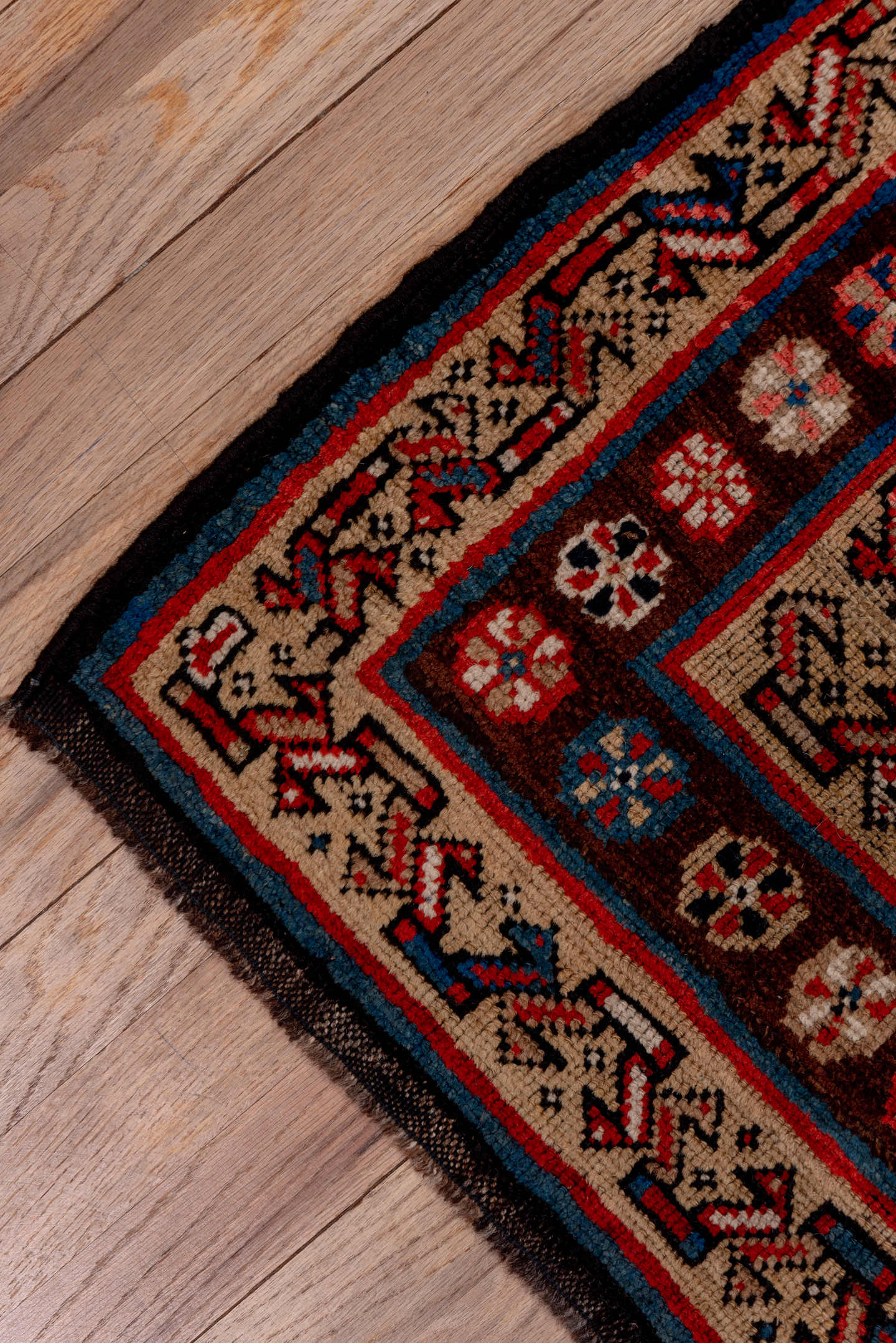 3' x 11' one-of-a-kind handmade antique Kurd runner rug. Color palette: navy, ivory, rust, crimson, camel, slate, blue