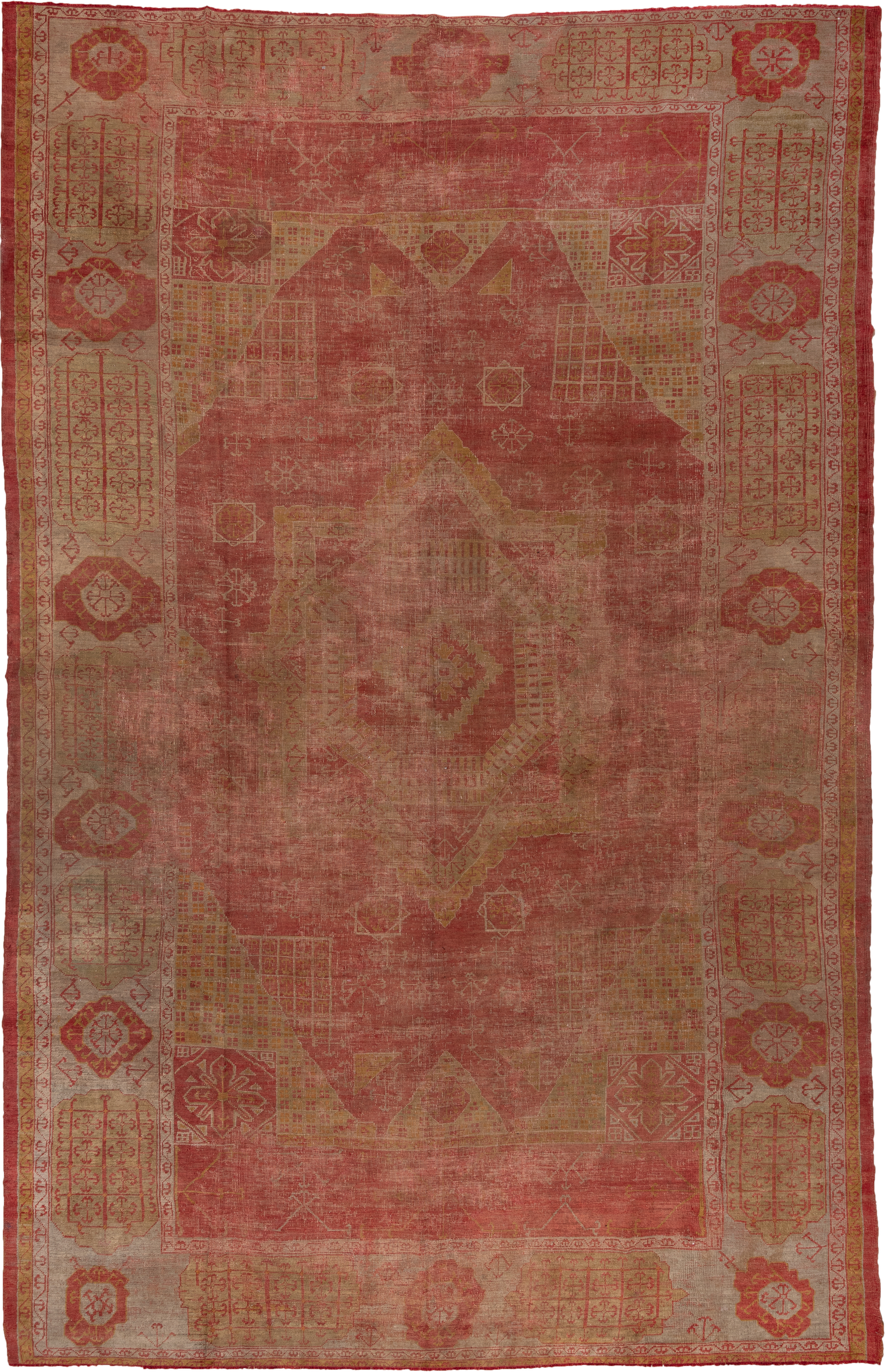 10' x 15' one-of-a-kind handmade vintage Oushak rug. Color palette: coral, rose, beige, gold, terra cotta, camel, rust