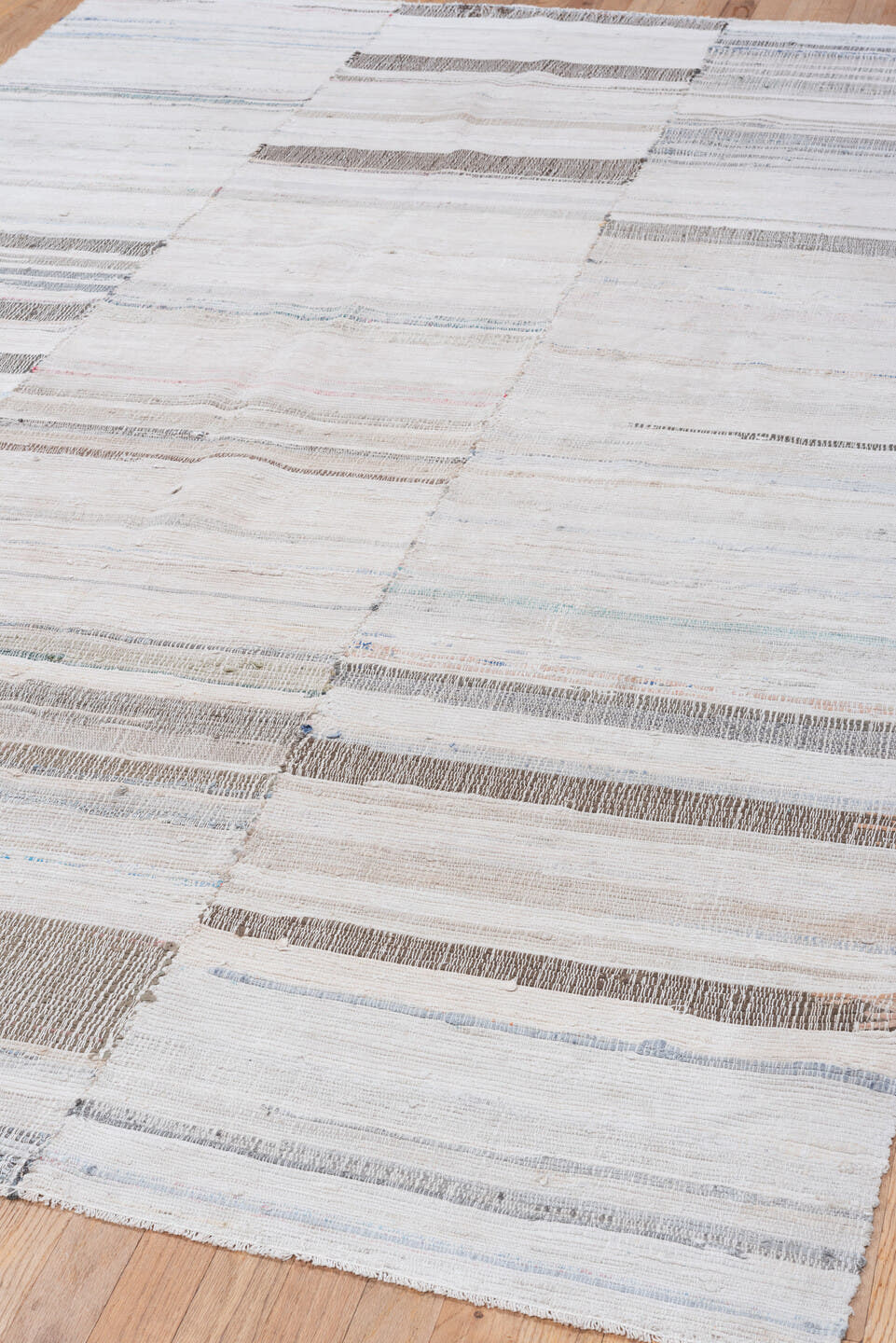 6' x 9' one-of-a-kind handmade vintage Rag Rug medium size rug. Color palette: ivory, cream, taupe, gray, pale blue, beige