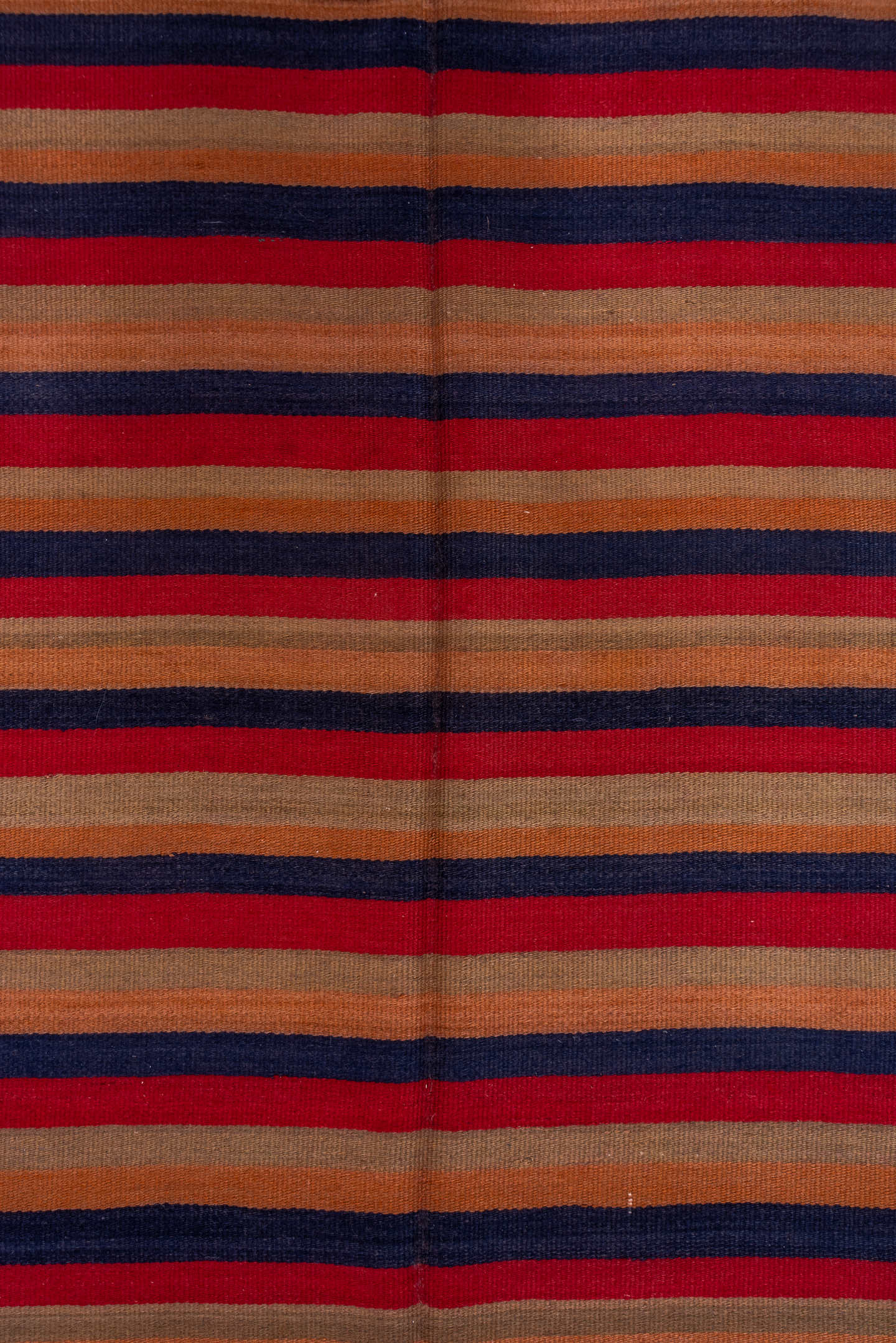 4' x 10' one-of-a-kind handmade vintage Kilim runner rug. Color palette: camel, navy, rust, red, tan, beige, blue