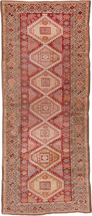 4' x 11' one-of-a-kind handmade vintage Kurd runner rug. Color palette: terra cotta, ivory, rust, rose, camel, taupe, brown