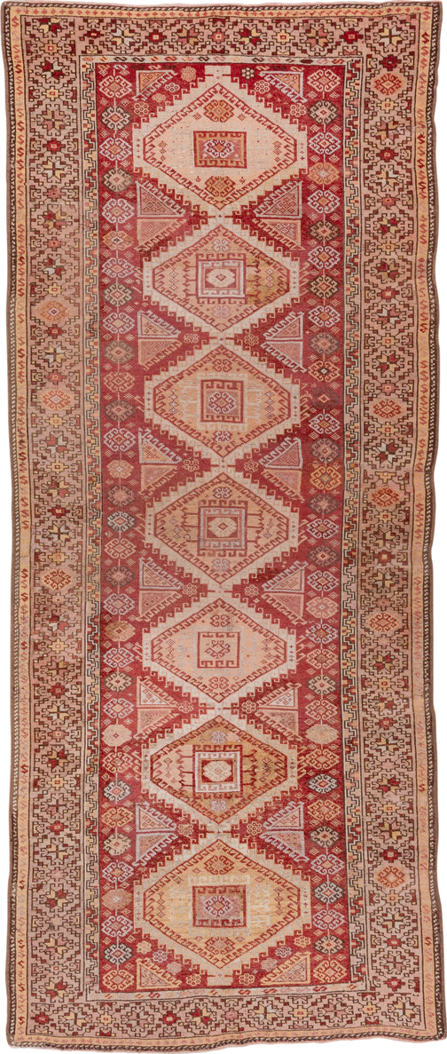 4' x 11' one-of-a-kind handmade vintage Kurd runner rug. Color palette: terra cotta, ivory, rust, rose, camel, taupe, brown