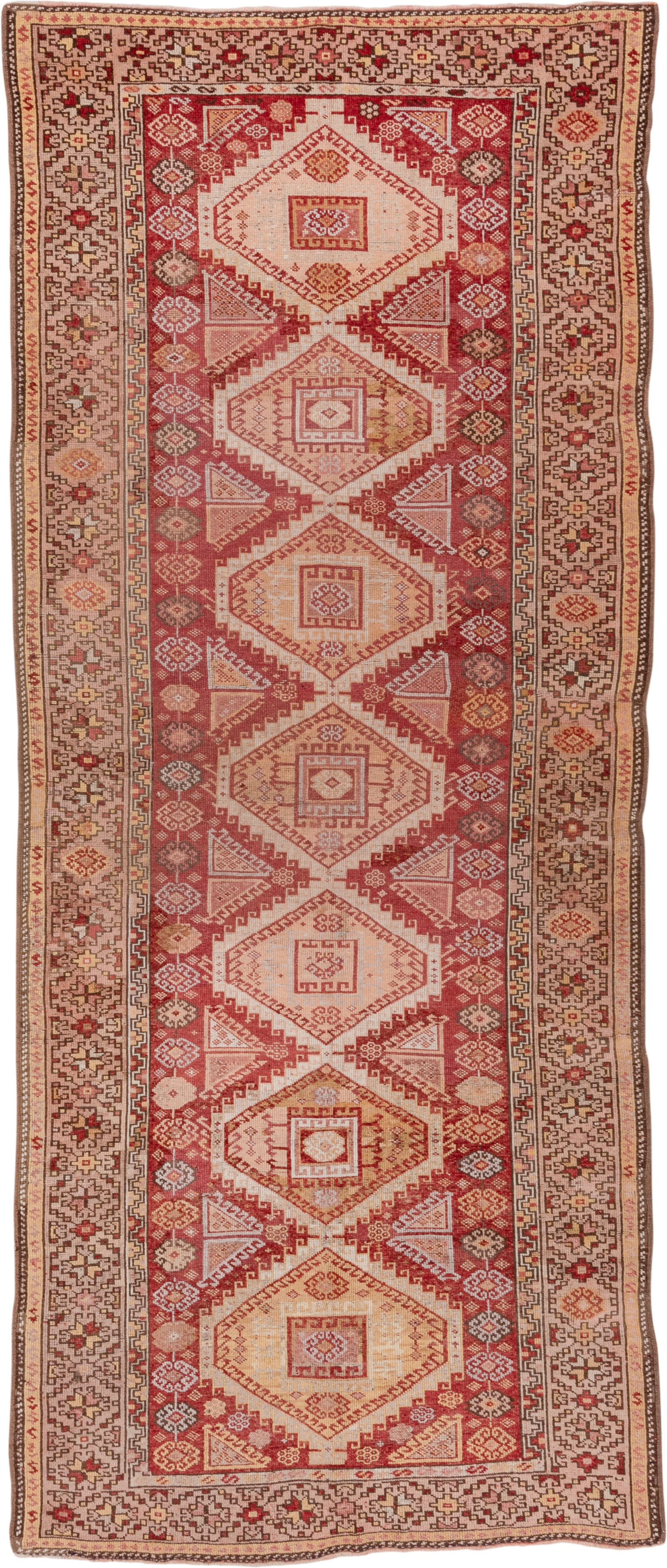 4' x 11' one-of-a-kind handmade vintage Kurd runner rug. Color palette: terra cotta, ivory, rust, rose, camel, taupe, brown