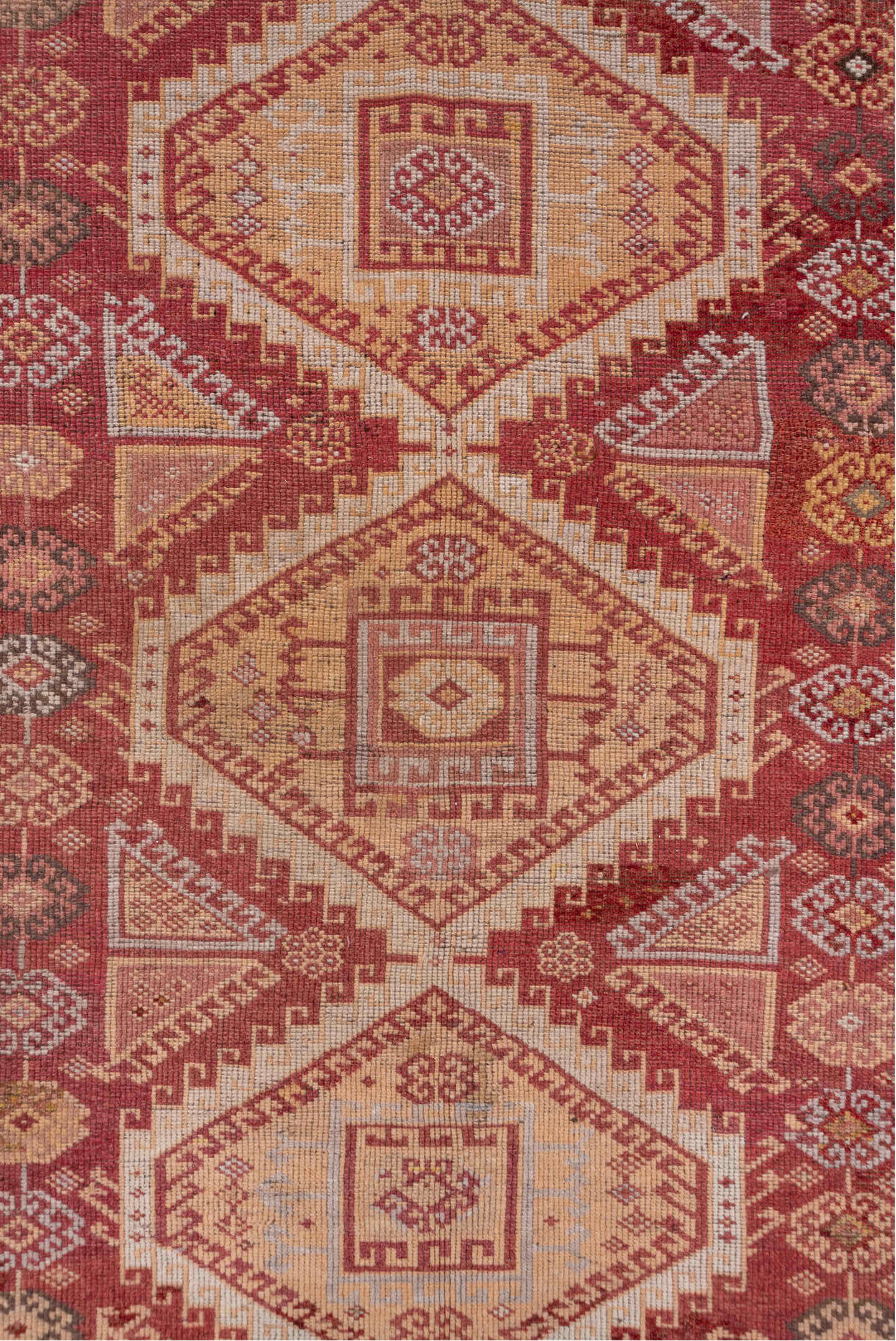 4' x 11' one-of-a-kind handmade vintage Kurd runner rug. Color palette: terra cotta, ivory, rust, rose, camel, taupe, brown