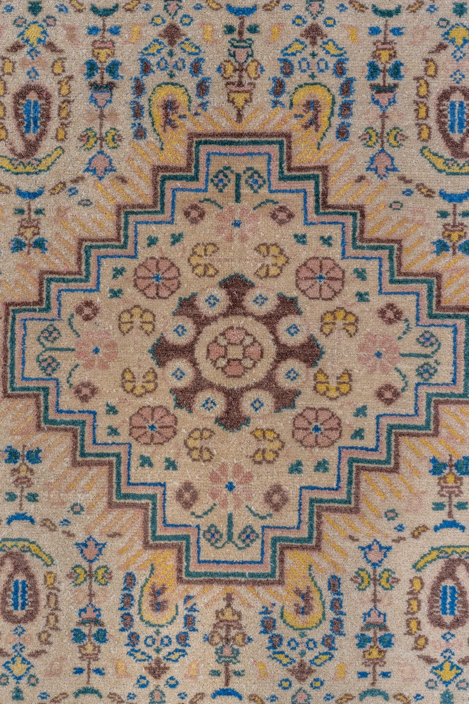 5' x 8' one-of-a-kind handmade vintage Sivas medium size rug. Color palette: ivory, blue, brown, taupe, gold, camel, beige