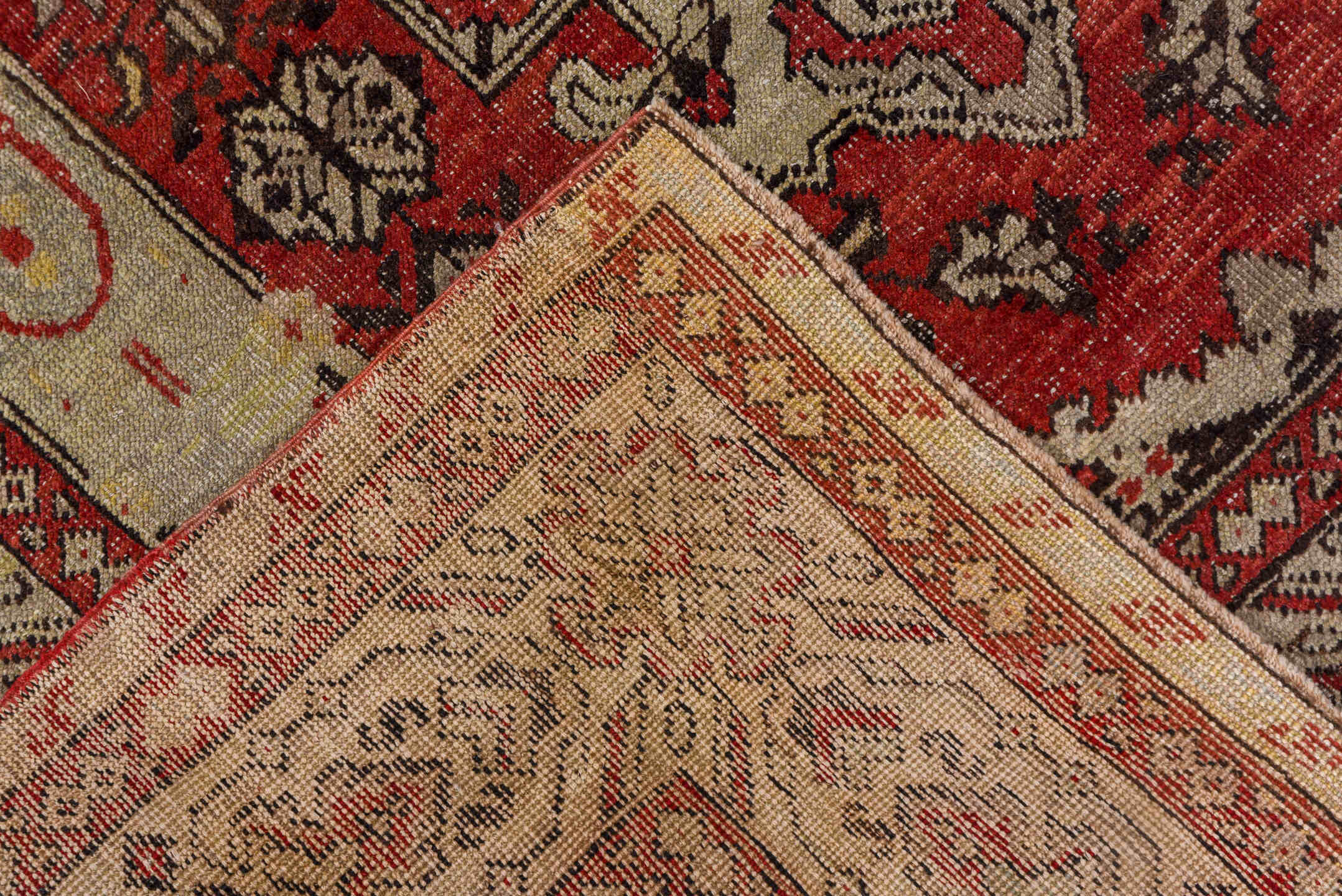 4' x 7' one-of-a-kind handmade vintage Oushak rug. Color palette: brown, gray, pink, red, redwood