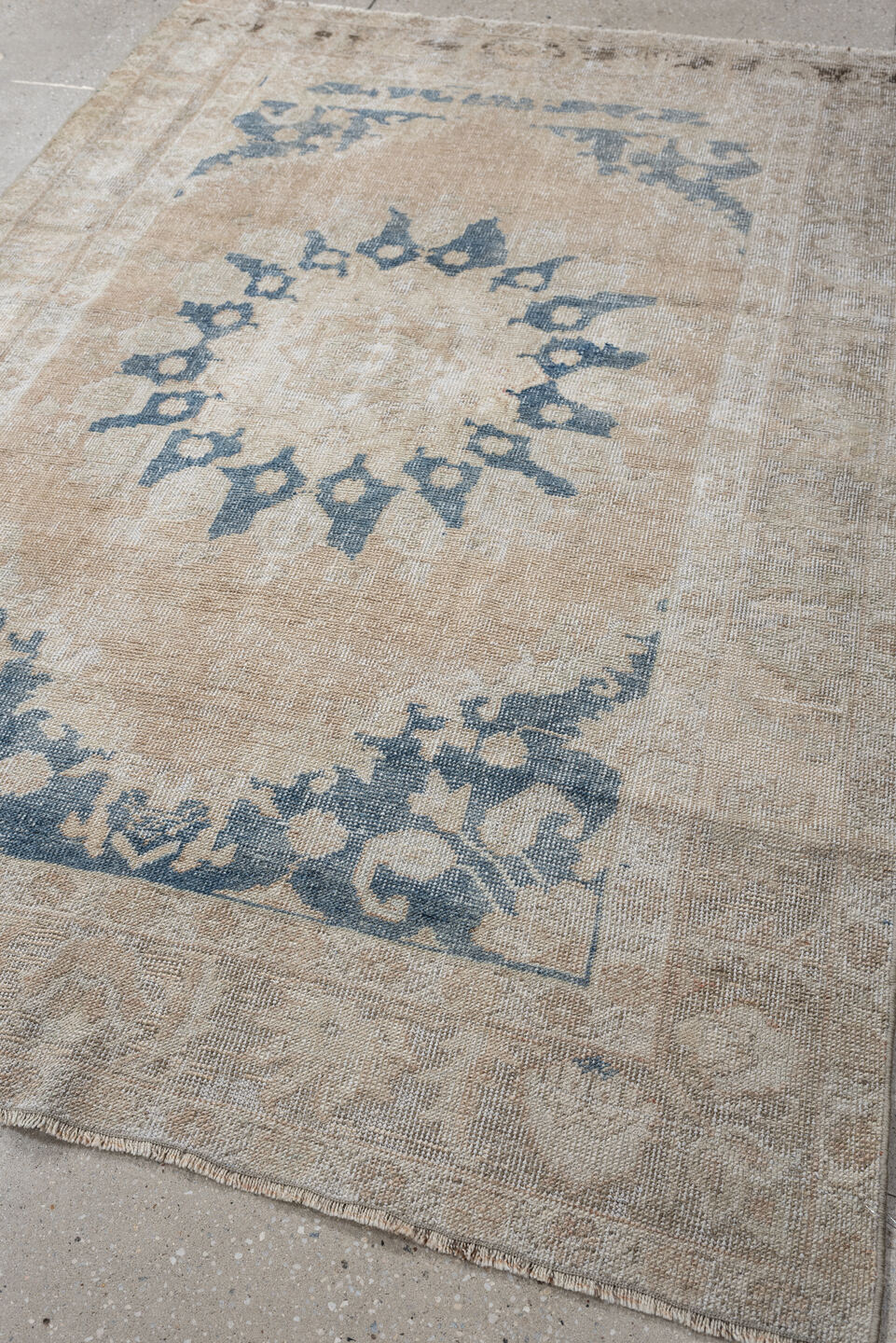 4' x 6' one-of-a-kind handmade antique Anatolian rug. Color palette: ivory, beige, muted blue, taupe, sand, camel, blue