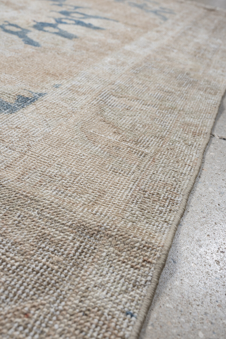 4' x 6' one-of-a-kind handmade antique Anatolian rug. Color palette: ivory, beige, muted blue, taupe, sand, camel, blue