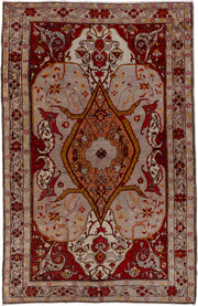 4' x 7' one-of-a-kind handmade vintage Oushak rug. Color palette: ivory, rust, terracotta, crimson, gold, taupe, camel