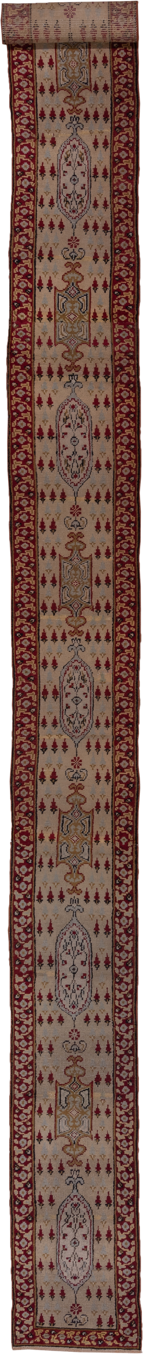 1' x 18' one-of-a-kind handmade vintage Oushak rug. Color palette: ivory, crimson, burgundy, taupe, brown, gold, red, beige