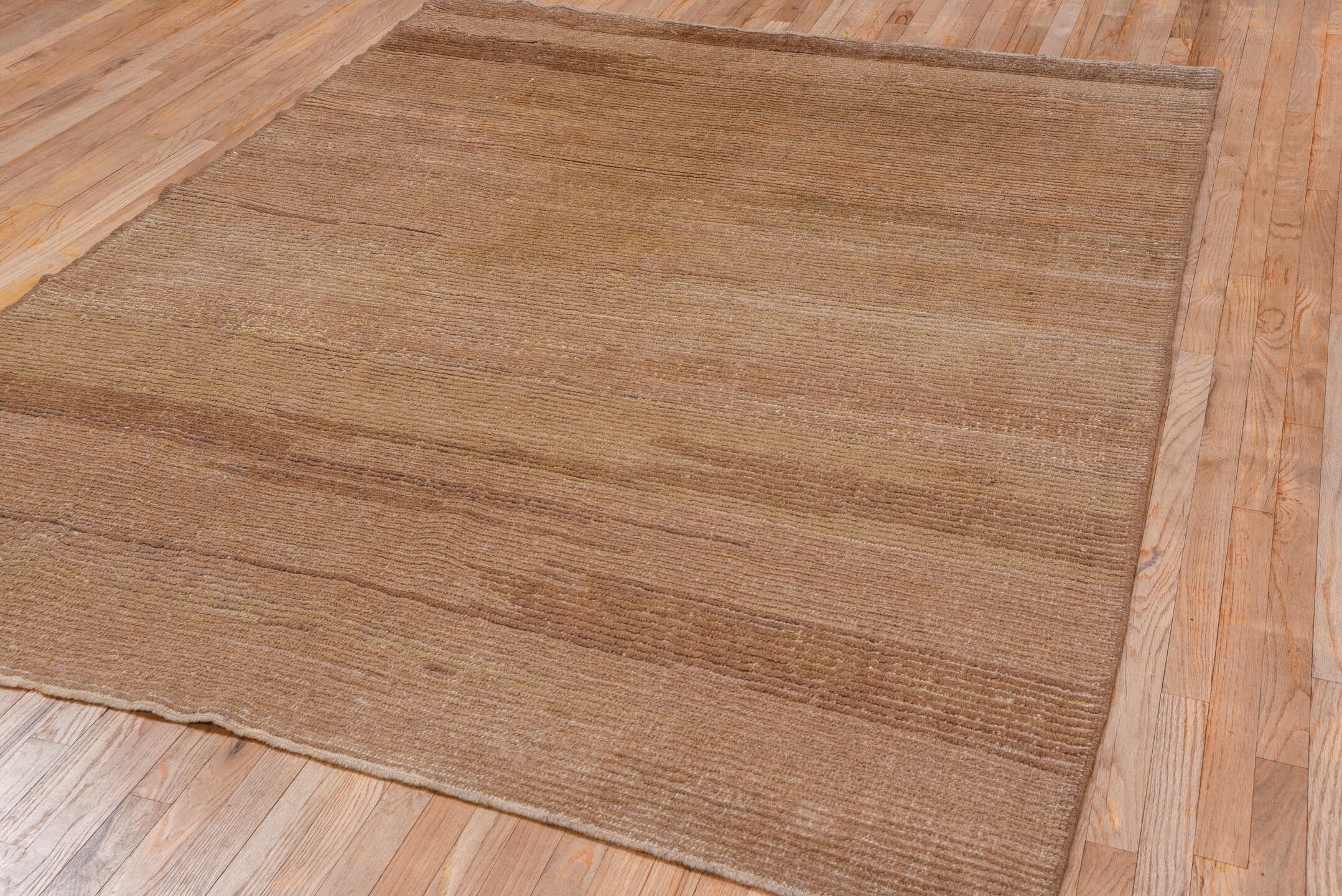 6' x 8' one-of-a-kind handmade vintage Tulu medium size rug. Color palette: taupe, camel, beige, brown, gray