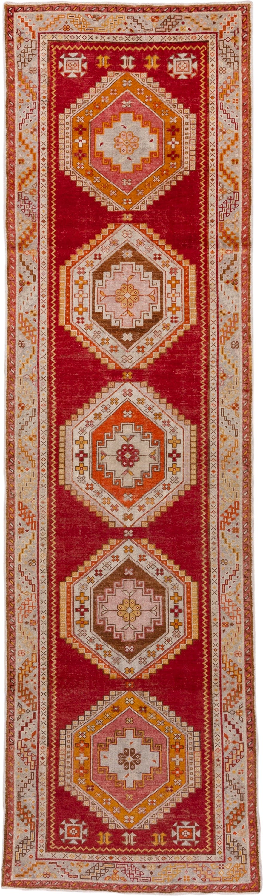 3' x 11' one-of-a-kind handmade vintage Oushak runner rug. Color palette: red, ivory, orange, gold, rose, taupe, rust