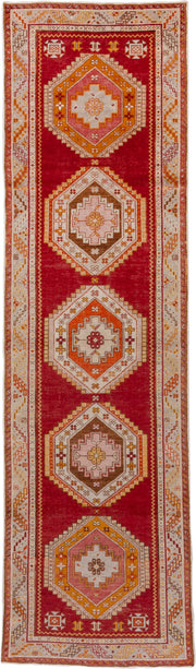 3' x 11' one-of-a-kind handmade vintage Oushak runner rug. Color palette: red, ivory, orange, gold, rose, taupe, rust