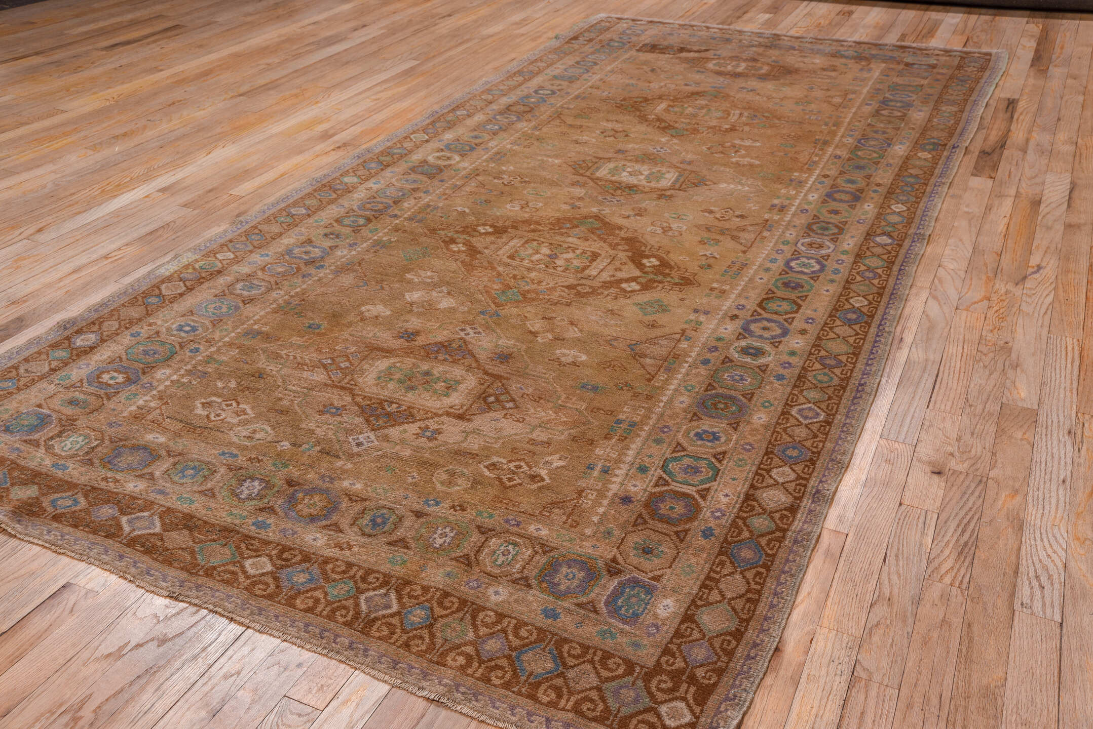 5' x 11' one-of-a-kind handmade vintage Oushak runner rug. Color palette: taupe, tan, camel, dusty blue, ivory, rust, sage