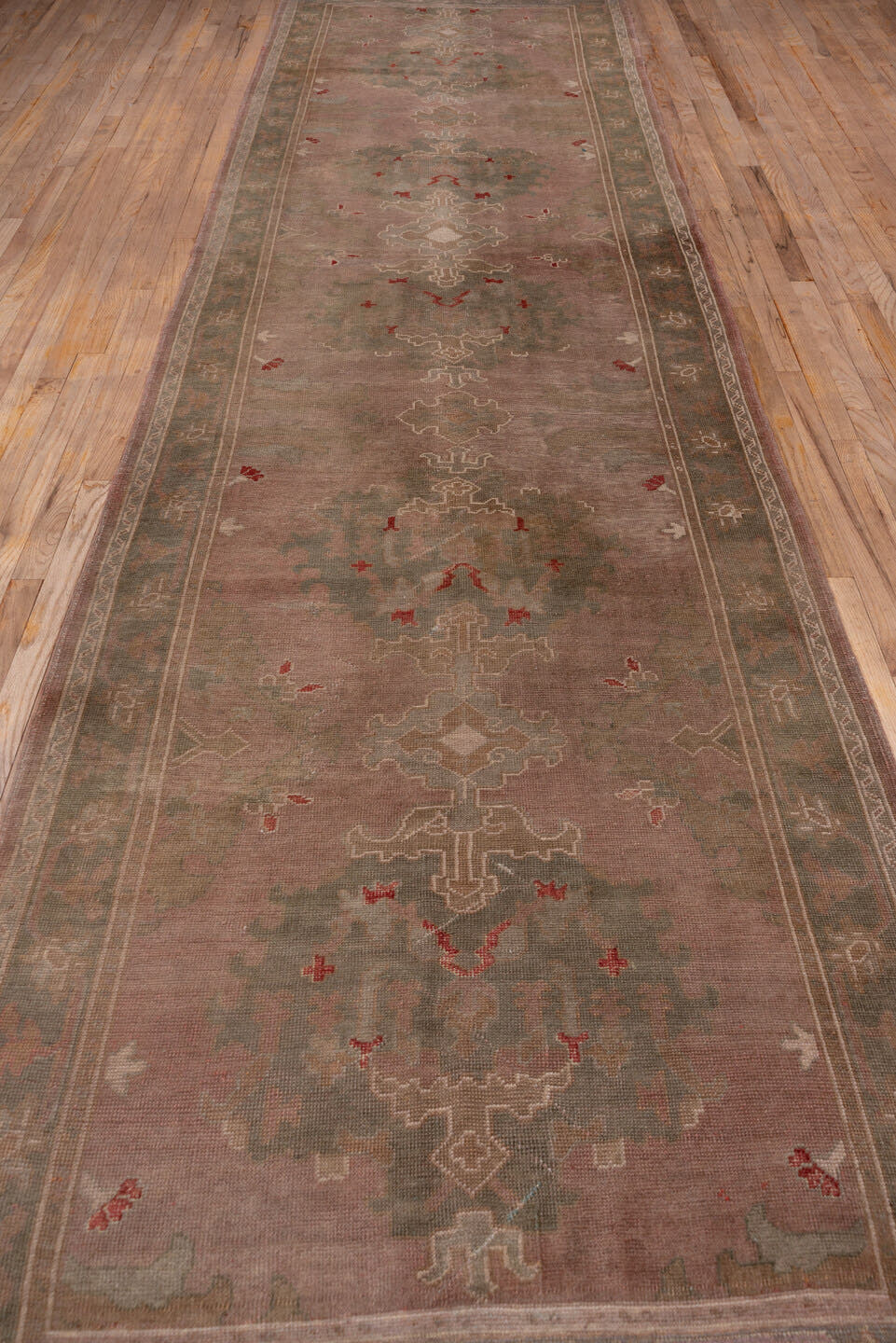 4' x 16' one-of-a-kind handmade antique Oushak runner rug. Color palette: rose, taupe, sage, ivory, rust, brown, pink, red