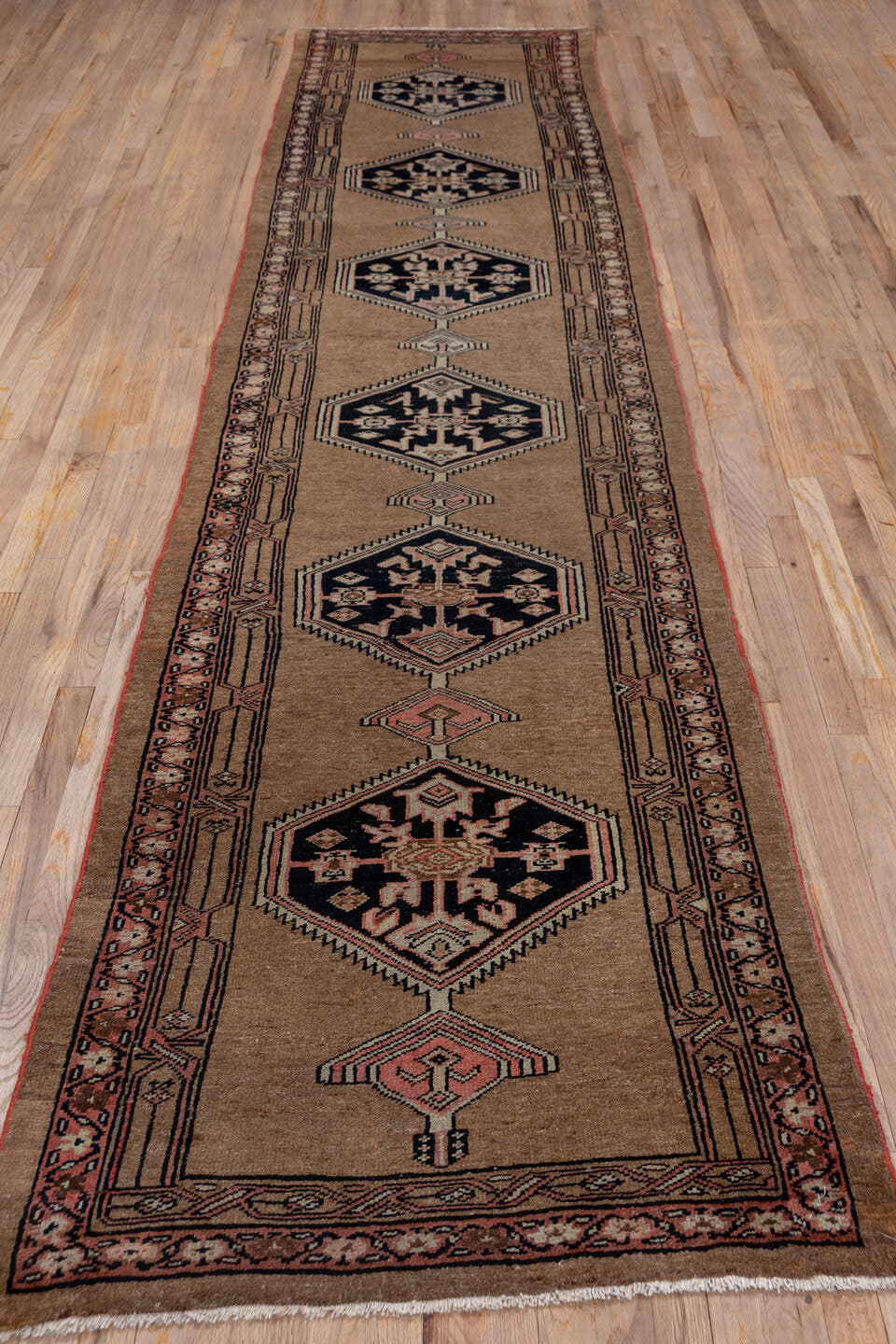 3' x 13' one-of-a-kind handmade antique Sarab runner rug. Color palette: camel, navy, rust, rose, ivory, brown, beige, blue