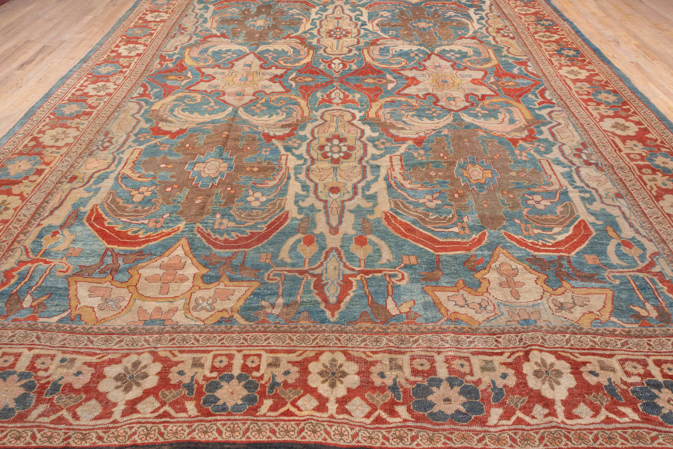 12' x 15' one-of-a-kind handmade antique Sultanabad oversize rug. Color palette: turquoise, terra cotta, ivory, taupe