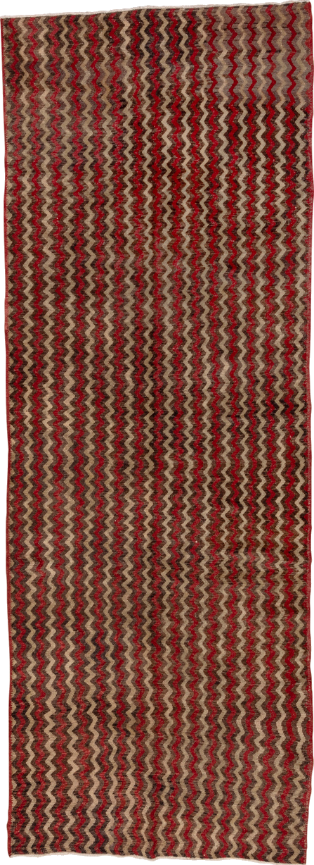 4' x 12' one-of-a-kind handmade vintage Tulu runner rug. Color palette: brown, red