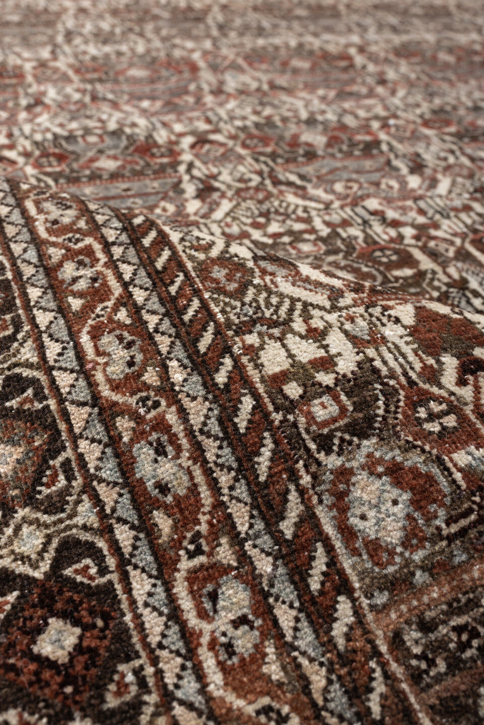4' x 6' one-of-a-kind handmade antique Abadeh rug. Color palette: ivory, rust, brown, slate, charcoal, taupe, terracotta