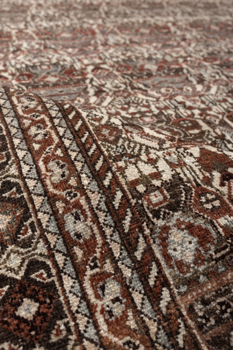4' x 6' one-of-a-kind handmade antique Abadeh rug. Color palette: ivory, rust, brown, slate, charcoal, taupe, terracotta