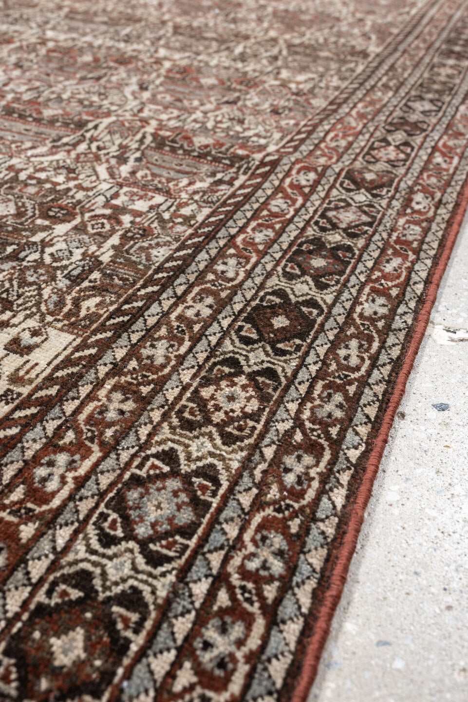 4' x 6' one-of-a-kind handmade antique Abadeh rug. Color palette: ivory, rust, brown, slate, charcoal, taupe, terracotta