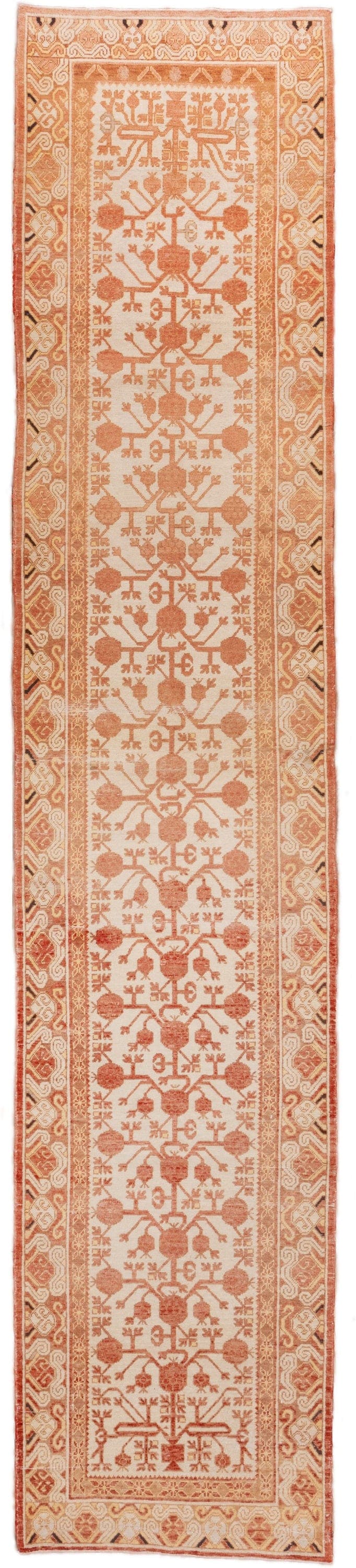 3' x 16' one-of-a-kind handmade vintage Khotan runner rug. Color palette: ivory, rust, peach, terra cotta, camel, terracotta