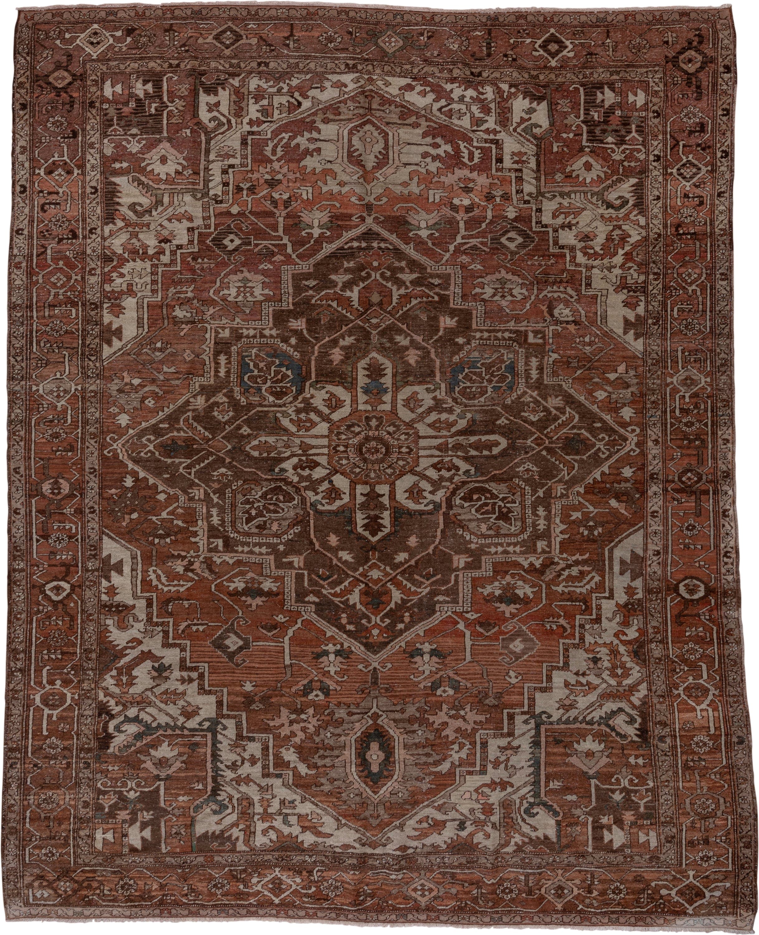 9' x 11' one-of-a-kind handmade vintage Serapi large size rug. Color palette: rust, brown, ivory, terra cotta, taupe