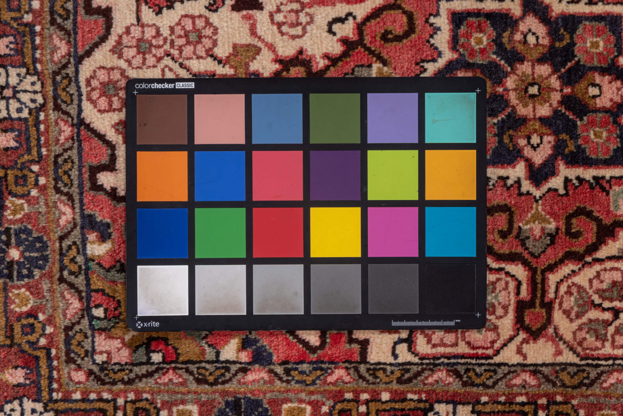 2' x 3' one-of-a-kind handmade vintage Sarouk small size rug. Color palette: pink, red, brown, gray, orange, off-white