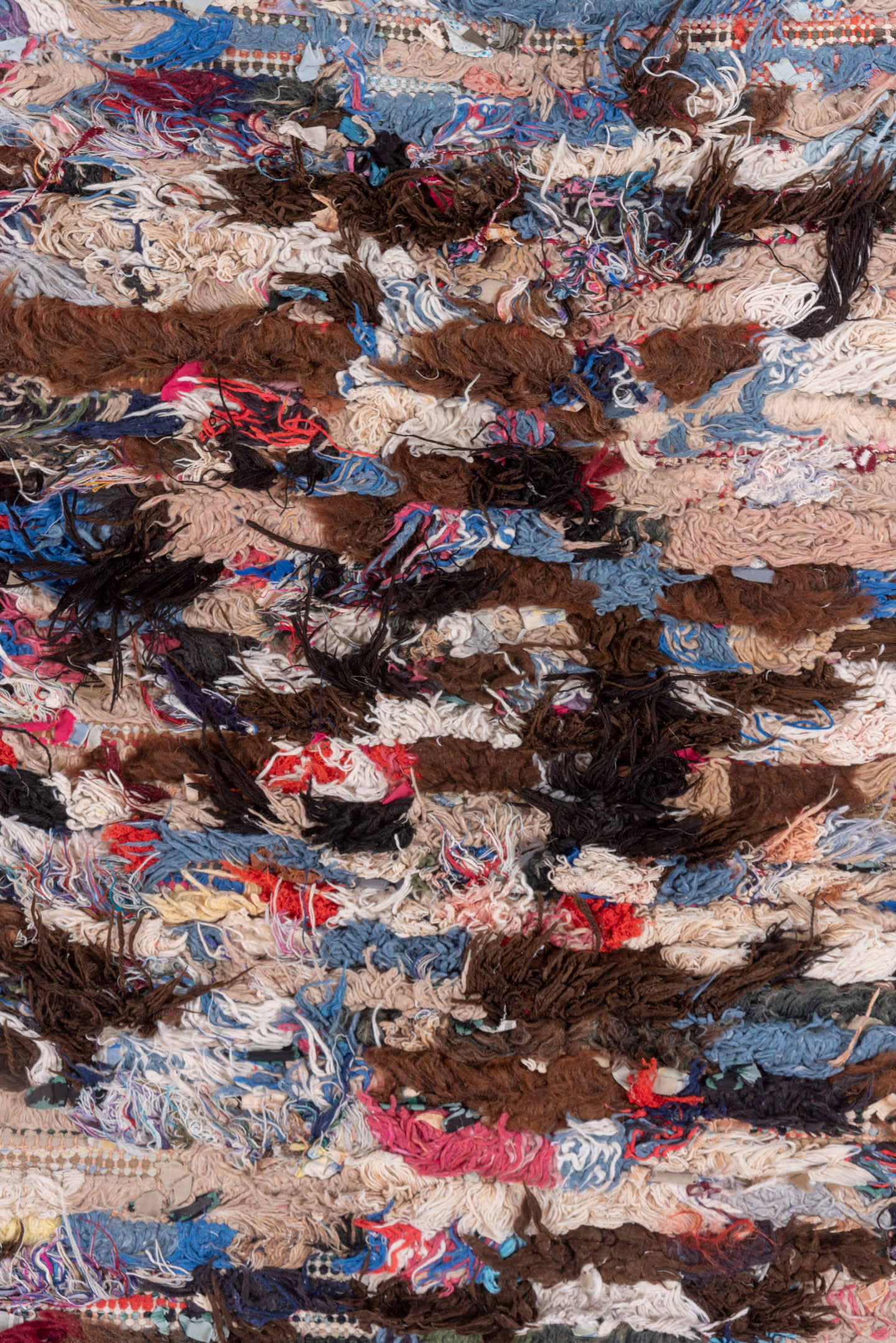 2' x 6' one-of-a-kind handmade vintage Rag Rug runner rug. Color palette: brown, ivory, blue, red, charcoal, cream, burgundy
